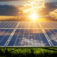 Image of a solar panel being lit up by the sun.